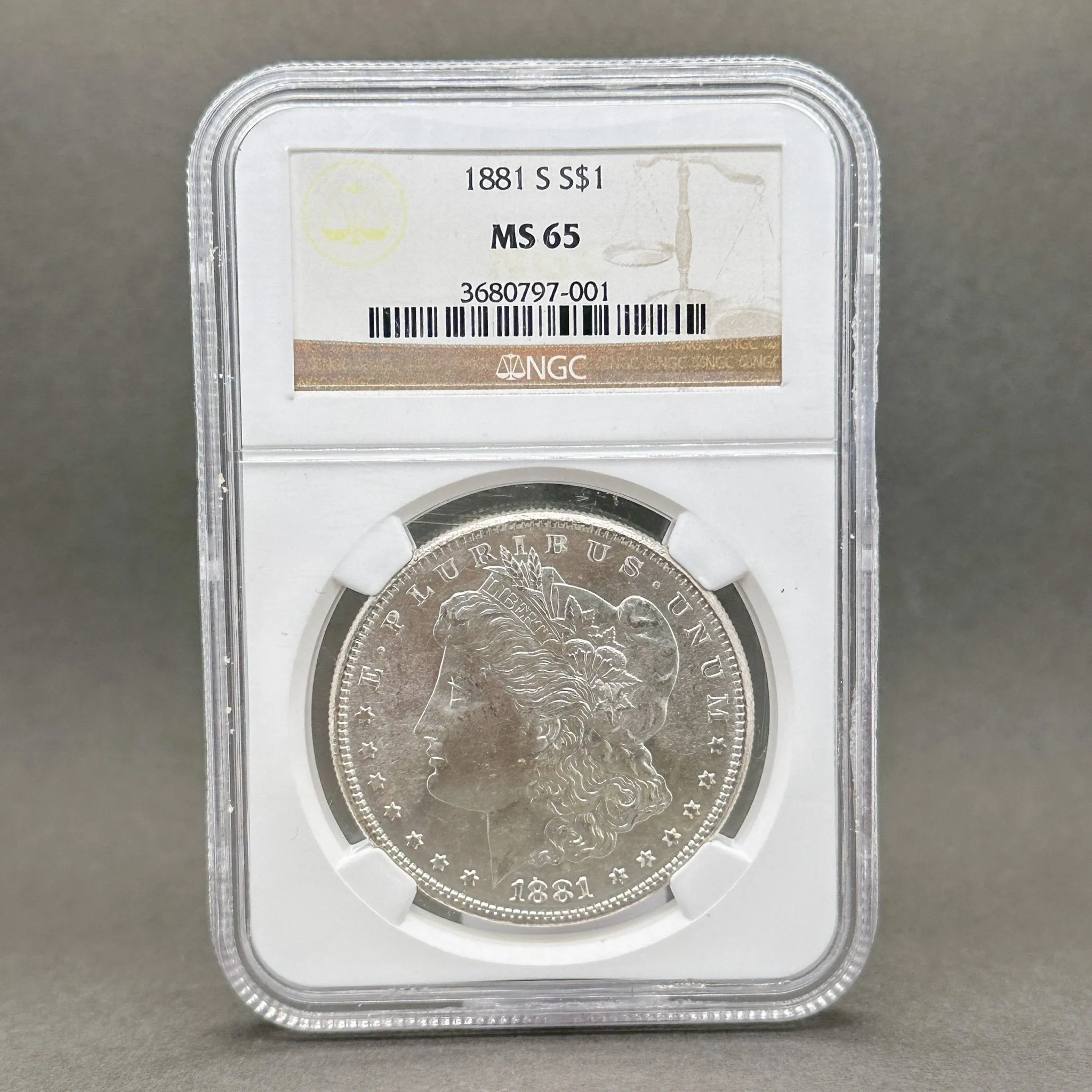 Estate 1881 0.900 Fine Silver Morgan Dollar NGC MS65